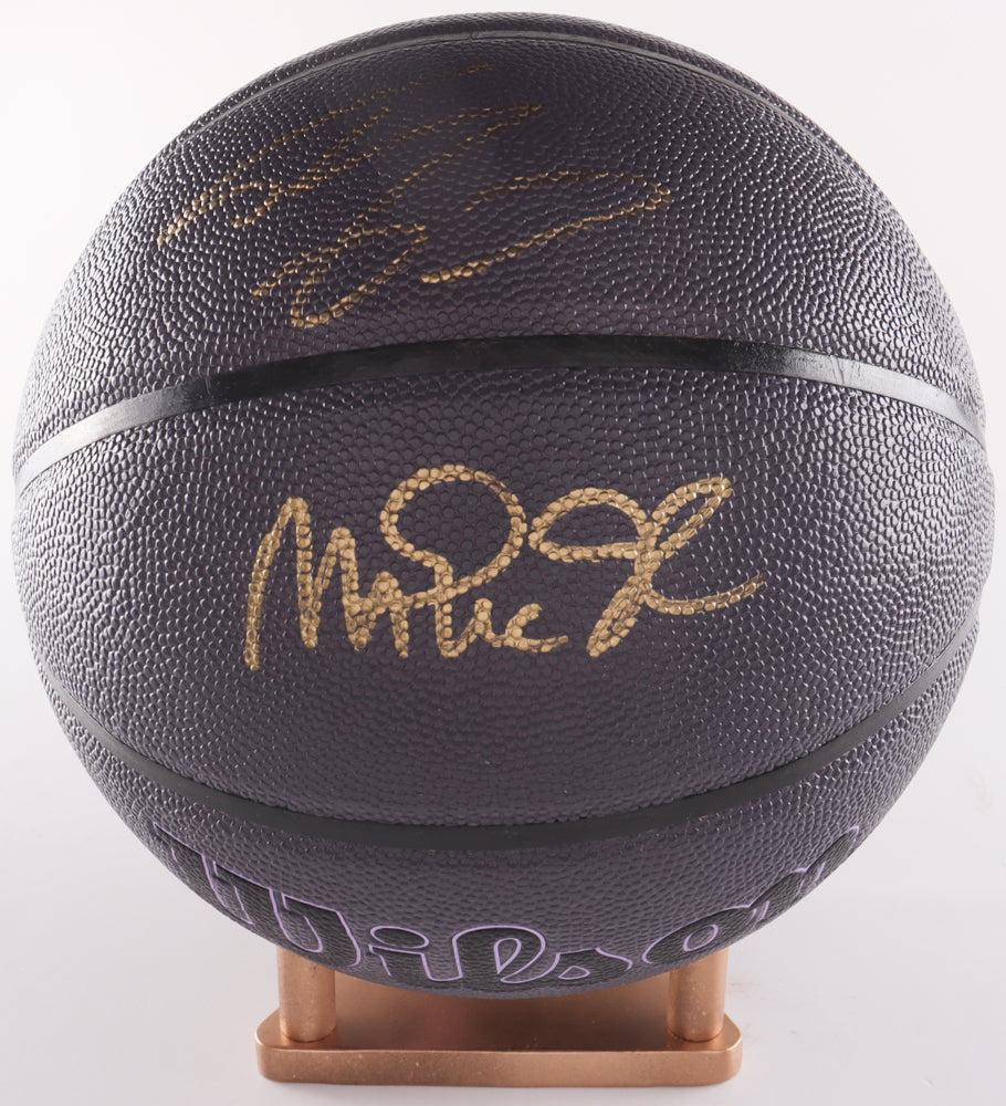 Magic Johnson and Shaquille O'Neal Dual Signed Black Basketball with Display Case and Plaque