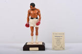 MUHAMMAD ALI: A 1:9 scale limited edition (1414/5000) cold cast porcelain resin figure of Muhammad Ali sculpted by Paul Szeiler for Endurance Ltd